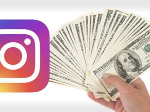 أموال مع شعار تطبيق الإنستغرام