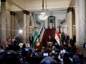Egypt's Foreign Minister Sameh Shoukry (C-R) and his Saudi counterpart Faisal bin Farhan (C-L) give a press conference following a meeting in Cairo on January 28, 2024. 