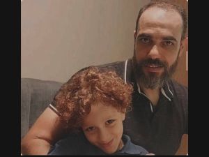 الطبيب محمد رفقة ابنه الشهيد يوسف