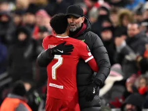 Liverpool's German manager Jurgen Klopp embraces Liverpool's Colombian midfielder #07 Luis Diaz as he leaves the game, substituted during the UEFA Europa League group E football match between Liverpool and Linzer ASK at Anfield in Liverpool, north west England on November 30, 2023. (Photo by Oli SCARFF / AFP)