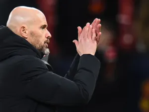 Manchester United's Dutch manager Erik ten Hag claps after the UEFA Champions League group A football match between Manchester United and FC Bayern Munich at Old Trafford stadium in Manchester, north west England, on December 12, 2023. (Photo by PETER POWELL / AFP)
