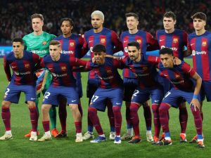 فريق برشلونة (Photo by LLUIS GENE / AFP)