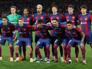 فريق برشلونة (Photo by LLUIS GENE / AFP)