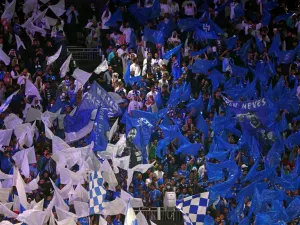 Hilal's supporters cheer after their team's first goal during the AFC Champions League football match between Saudi Arabia's Al-Hilal SFC and Iran’s Sepahan FC at the Kingdom Arena Stadium in Riyadh on February 22, 2024. (Photo by Fayez NURELDINE / AFP)