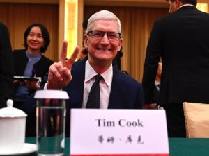 Tim Cook in China to open second largest Apple store and revive iPhone sales