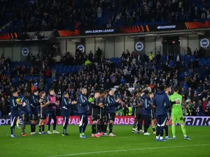 Ajax players applaud their fans after the UEFA Europa League Group B football match between Brighton and Hove Albion and Ajax at the American Express Community Stadium in Brighton, southern England on October 26, 2023. Brighton won the match 2-0. (Photo by Glyn KIRK / AFP)