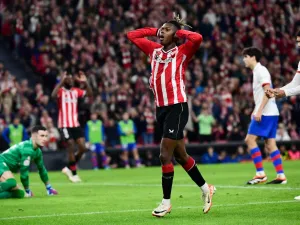 Athletic Bilbao's Spanish forward #11 Nico Williams reacts to missing a goal opportunity during the Spanish Copa del Rey (King's Cup) quarter final football match between Athletic Club Bilbao and FC Barcelona at the San Mames stadium in Bilbao on January 24, 2024. (Photo by ANDER GILLENEA / AFP)