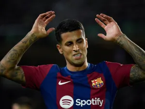 Barcelona's Portuguese defender #02 Joao Cancelo reacts during the Spanish league football match between FC Barcelona and Athletic Club Bilbao at the Estadi Olimpic Lluis Companys in Barcelona on October 22, 2023. (Photo by Josep LAGO / AFP)