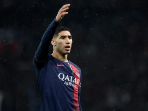 Paris Saint-Germain's Moroccan defender #02 Achraf Hakimi reacts during the French L1 football match between Rennes and Paris Saint-Germain (PSG) at the Parc des Princes stadium in Paris on February 25, 2024. (Photo by FRANCK FIFE / AFP)