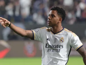 Real Madrid's Brazilian forward #11 Rodrygo celebrates after scoring his team's fourth goal during the Spanish Super Cup final football match between Real Madrid and Barcelona at the Al-Awwal Park Stadium in Riyadh, on January 14, 2024. (Photo by Fayez NURELDINE / AFP)