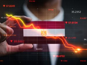Egypt devalues its pound with record interest rate hike