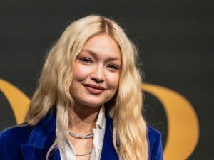 Gigi Hadid plants a kiss on Bradley Cooper during PDA-packed date night in NYC