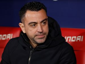 تشافي هيرنانديز (Photo by OSCAR DEL POZO / AFP)