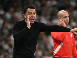 تشافي (Photo by JAVIER SORIANO / AFP)