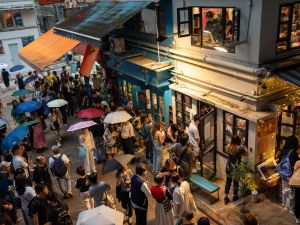 Visitors pay tribute to independent bookstore 'Mount Zero' on its last day of business in Hong Kong. Photo by Justin CHAN / AFP) bookstore