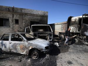 Illegal Settlers attack West Bank towns with live fire and set them ablaze