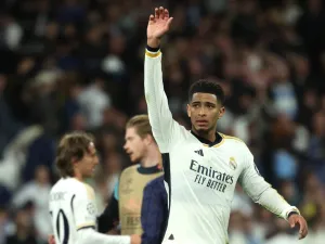 Real Madrid's English midfielder #5 Jude Bellingham reacts at the end of the UEFA Champions League quarter final first leg football match between Real Madrid CF and Manchester City at the Santiago Bernabeu stadium in Madrid on April 9, 2024. (Photo by Pierre-Philippe MARCOU / AFP)