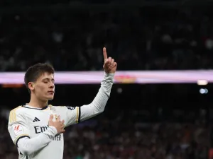 Real Madrid's Turkish midfielder #24 Arda Guler celebrates scoring his team's fourth goal during the Spanish league football match between Real Madrid CF and RC Celta de Vigo at the Santiago Bernabeu stadium in Madrid on March 10, 2024. (Photo by Pierre-Philippe MARCOU / AFP)