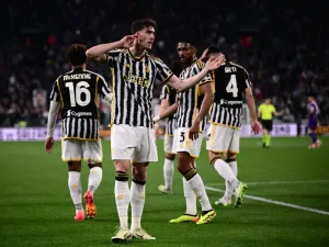 Juventus' Serbian forward #09 Dusan Vlahovic celebrates before his goal was denied by VAR due to offside during the Italian Serie A football match between Juventus and Fiorentina, at The Allianz Stadium, in Turin on April 7, 2024. (Photo by Marco BERTORELLO / AFP)