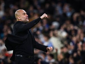 بيب غوارديولا مدرب مانشستر سيتي (Photo by Darren Staples / AFP)