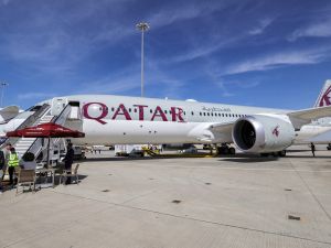 A Qatar Airways Boeing 787-9 jetliner aircraft is pictured on the tarmac (Photo by Giuseppe CACACE / AFP)
