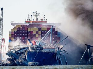Dali ship that struck Baltimore bridge is moving “fast, on time and on budget”