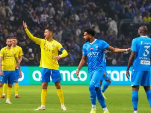 Nassr's Portuguese forward #07 Cristiano Ronaldo (3rd-L) reacts during the Riyadh Season Cup final match between Al-Nassr and Al-Hilal at the Kingdom Arena in Riyadh, on February 8, 2024. (Photo by Fayez Nureldine / AFP)