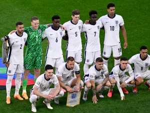 England's players pose for a team picture during the UEFA Euro 2024 Group C football match between Serbia and England at the Arena AufSchalke in Gelsenkirchen on June 16, 2024. (Photo by INA FASSBENDER / AFP)