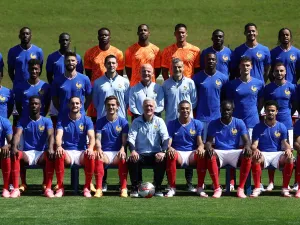 France's head coach Didier Deschamps (Bottom Centre), French forward and captain Kylian Mbappe (Bottom CR) and France's players and coaching staff pose for a photo ahead of a training session as part of the team's preparation for the UEFA Euro 2024 European football championships, in Clairefontaine-en-Yvelines, on June 7, 2024. (Photo by FRANCK FIFE / AFP)
