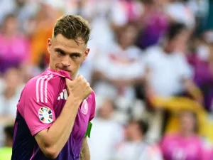 Germany's defender #06 Joshua Kimmich celebrates after winning the UEFA Euro 2024 Group A football match between Germany and Hungary at the Stuttgart Arena in Stuttgart on June 19, 2024. (Photo by Tobias SCHWARZ / AFP)