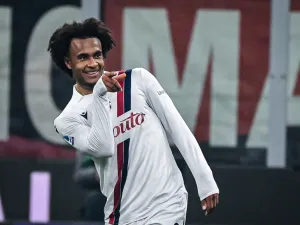 Bologna's Dutch forward #9 Joshua Zirkzee celebrates after scoring the opening goal during the Italian Serie A football match between AC Milan and Bologna at the San Siro Stadium, in Milan on January 27, 2024. (Photo by Piero CRUCIATTI / AFP)