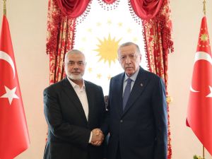 Turkish President Recep Tayyip Erdogan and Ismail Haniyeh