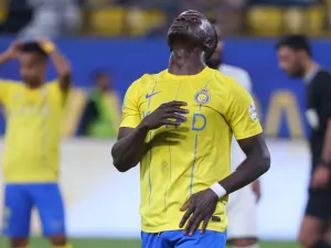Nassr's Senegalese Forward #10 Sadio Mane reacts after missing a penalty during the Saudi Pro League football match between Al-Nassr and Al-Feiha at Al -Awwal Stadium in Riyadh on April 19, 2024. (Photo by Fayez NURELDINE / AFP)