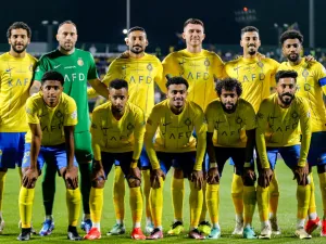 Nassr's starting eleven pose for the group photo before the start of the Saudi Pro League football match between Damac FC and Al-Nassr FC at Prince Sultan bin Abdulaziz Sports City stadium in Abha on April 5, 2024. (Photo by Mohammed ALSHEHRI / AFP)