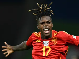 Spain's midfielder #17 Nico Williams celebrates scoring his team's first goal during the UEFA Euro 2024 final football match between Spain and England at the Olympiastadion in Berlin on July 14, 2024. (Photo by INA FASSBENDER / AFP)