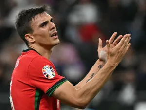 Portugal's midfielder #06 Joao Palhinha reacts to a missed chance during the UEFA Euro 2024 round of 16 football match between Portugal and Slovenia at the Frankfurt Arena in Frankfurt am Main on July 1, 2024. (Photo by JAVIER SORIANO / AFP)