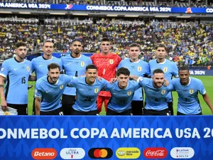 Uruguay's players pose for pictures ahead of the Conmebol 2024 Copa America tournament quarter-final football match between Uruguay and Brazil at Allegiant Stadium in Las Vegas, Nevada on July 6, 2024. (Photo by Robyn Beck / AFP)