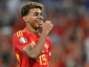 Spain's forward #19 Lamine Yamal celebrates at the end of the UEFA Euro 2024 semi-final football match between Spain and France at the Munich Football Arena in Munich on July 9, 2024. (Photo by MIGUEL MEDINA / AFP)