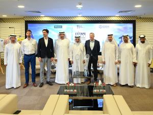 • Saeed Hareb, Nasser Aman Al Rahma, Maher Julfar and speakers pose with the Tour de France jersey