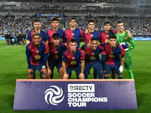 FC Barcelona poses for a team photo before the start of a 2024 FC Series pre-season friendly football match between FC Barcelona and Manchester City at Camping World Stadium in Orlando, Florida, on July 30, 2024. (Photo by CHANDAN KHANNA / AFP)