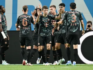 Bayern Munich’s players celebrate a goal during a friendly football match between Tottenham Hotspur and Bayern Munich at the Seoul World Cup Stadium in Seoul on August 3, 2024. (Photo by ANTHONY WALLACE / AFP)