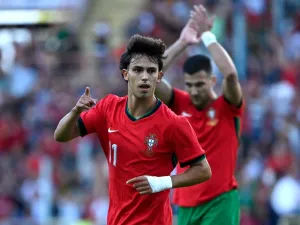 Portugal's forward #11 Joao Felix celebrates scoring a goal during the International friendly match between Portugal and Ireland at the Municipal Stadium in Aveiro, on June 11, 2024, ahead of the UEFA Euro 2024 football tournament in Germany. (Photo by MIGUEL RIOPA / AFP)