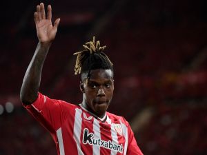 Athletic Bilbao's Spanish forward #11 Nico Williams waves during the Spanish Copa del Rey (King's Cup) final football match between Athletic Club Bilbao and RCD Mallorca at La Cartuja stadium in Seville on April 6, 2024. (Photo by CRISTINA QUICLER / AFP)