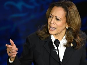 Was Kamala Harris wearing earbuds earrings?