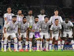 Members of Al Ain's starting side pose at the start of the AFC Champions League final first leg football match between UAE's Al Ain and Japan's Yokohama F. Marinos at Nissan Stadium in Yokohama, Kanagawa prefecture, south of Tokyo, on May 11, 2024. (Photo by Yuichi YAMAZAKI / AFP)