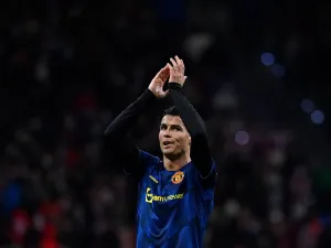 Manchester United's Portuguese forward Cristiano Ronaldo reacts at the end of the UEFA Champions League football match between Atletico de Madrid and Manchester United at the Wanda Metropolitano stadium in Madrid on February 23, 2022. (Photo by OSCAR DEL POZO / AFP)
