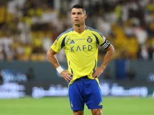 Nassr's Portuguese forward #07 Cristiano Ronaldo looks on during the Saudi Pro League football match between Al-Ahli and Al-Nassr at at al-Awwal Stadium in Riyadh on September 13, 2024. (Photo by Fayez NURELDINE / AFP)