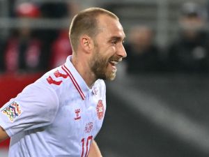 Denmark's midfielder #10 Christian Eriksen reacts after scoring Denmark's second goal during the UEFA Nations League, League A, Group A4 football match between Switzerland and Denmark at The Kybunpark in St Gallen on October 15, 2024. (Photo by Fabrice COFFRINI / AFP)