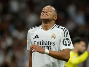 Real Madrid's French forward #09 Kylian Mbappe reacts during the Spanish league football match between Real Madrid CF and Villarreal CF at the Santiago Bernabeu stadium in Madrid on October 5, 2024. (Photo by OSCAR DEL POZO / AFP)