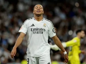 Real Madrid's French forward #09 Kylian Mbappe reacts during the Spanish league football match between Real Madrid CF and Villarreal CF at the Santiago Bernabeu stadium in Madrid on October 5, 2024. (Photo by OSCAR DEL POZO / AFP)